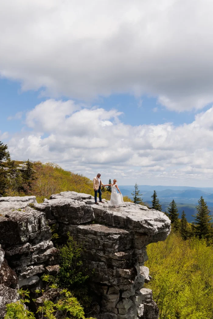 Couple on top of rock for elopement