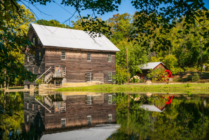 Cook's Old Mill with reflection in the water