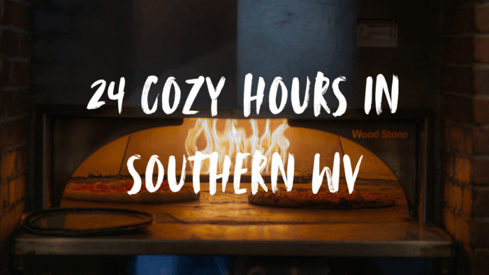 Gas-fired pizza oven with the text "24 cozy hours in Southern WV"